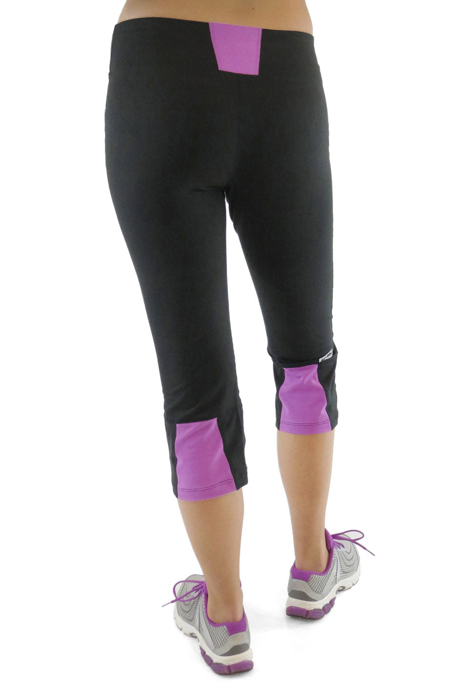#color_black-sugar-plum A pair of black crop pants with magenta and purple accents on the side, featuring a wide waistband and slim fit leg design.